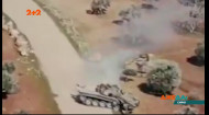 Військовий безпілотник зафільмував дивне протистояння сирійського танка й турецького бронетранспортера